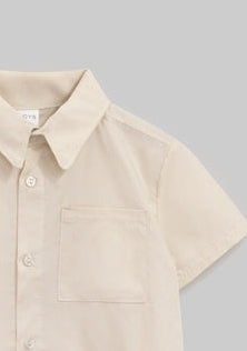 Camisa botones beige